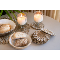 Kaars in glas op voet